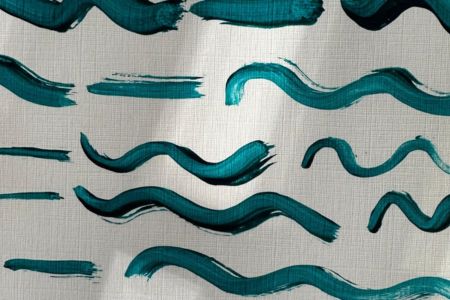 Wavy teal lines painted on a white background to represent calm